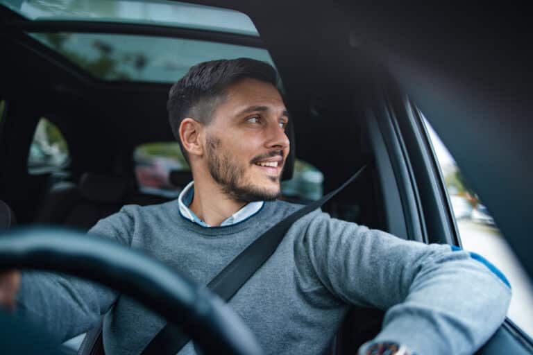 Man driving a car